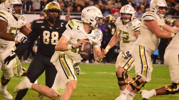 Haynes King running the ball against UCF